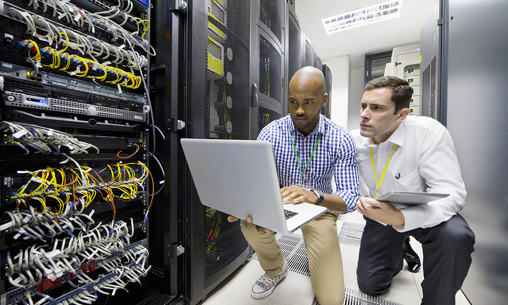 Network technicians performing IT support in a datacenter for a company in McMinnville Portland and Salem Oregon