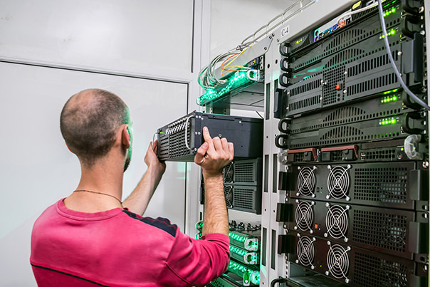 Network security engineer performing hardware maintenance and replacement in a data center for Northwest Techies, an IT company operating in the McMinnville Salem and Portland area in Oregon